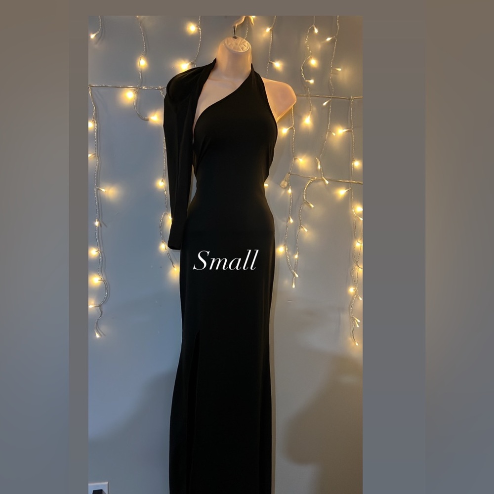 New very sexy one sleeve black stretchy dress with slit size large.